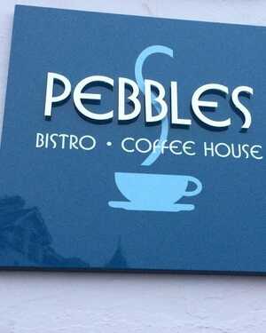 Sign for Pebbles cafe in Seaton Sign for Pebbles cafe in Seaton
