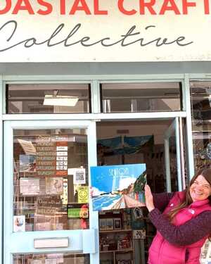 Store front of Coastal Craft Collective with shop owner Linda Store front of Coastal Craft Collective with shop owner Linda